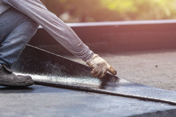 Professional Basement Waterproofing technician working in Burket, IN